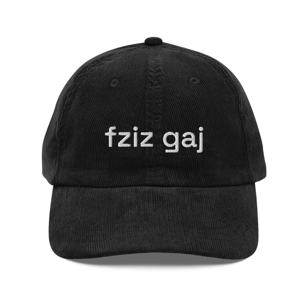 a black corduroy cap with stitched letters